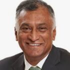 Headshot of Vassi Naidoo