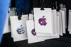 Apple Inc. logos are displayed on badges ahead of an event in the Brooklyn borough of New York, U.S., on Tuesday, Oct. 30, 2018. The iPad Pro update comes at an important time for the device, which hasn't been refreshed since mid-2017. While the tablet market is contracting overall, the iPad has been slowly regaining momentum thanks to new software and lower-priced models, but also because competitors like Amazon.com Inc. and Samsung Electronics Co. haven't wowed the market lately.