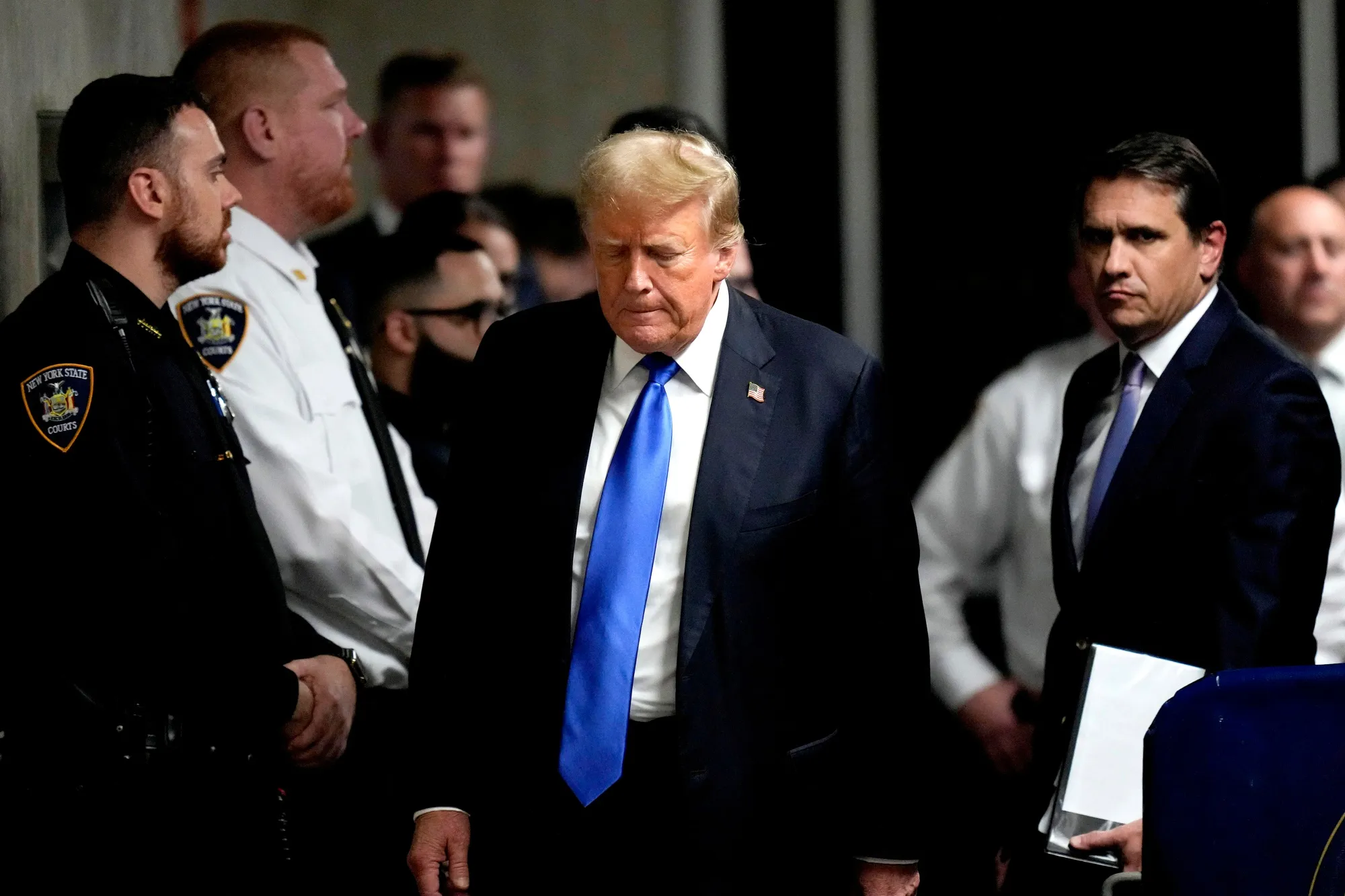 Donald Trump exits the courtroom after the verdict was read at Manhattan criminal court on May 30.&nbsp;