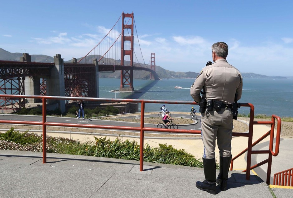 California Highway Patrol Sergeant Kevin Briggs looks at the span upon which he's talked many suicidal people out of jumping.