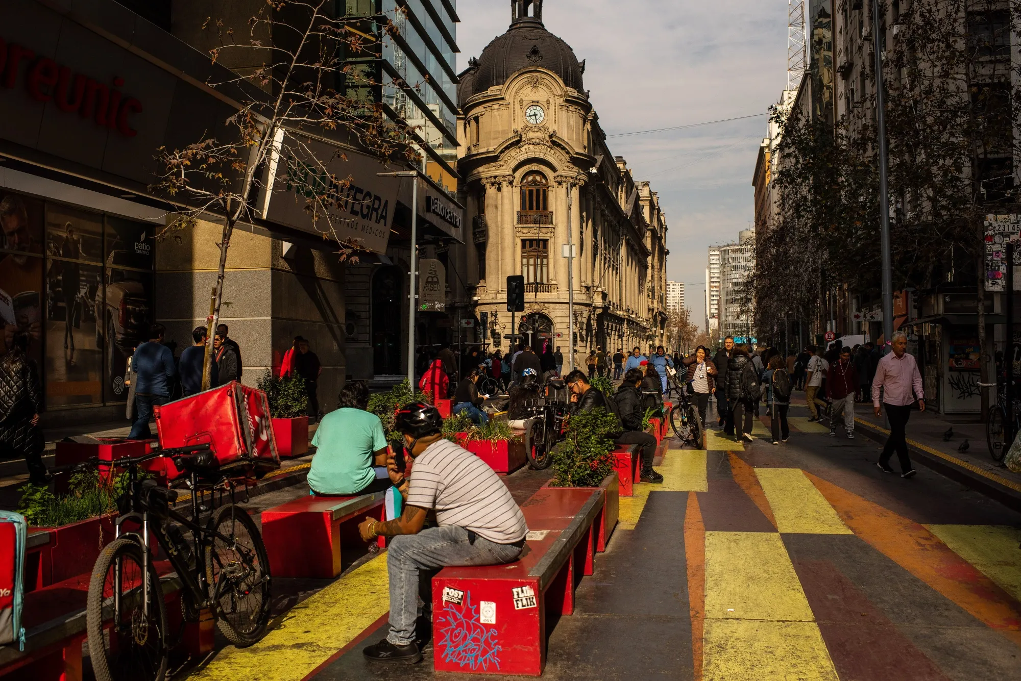 Pedestrians in the financial district of Santiago, Chile.