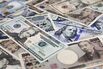 General Images Of Japanese Yen and US Dollars As Yen Extended Gains Against Dollar