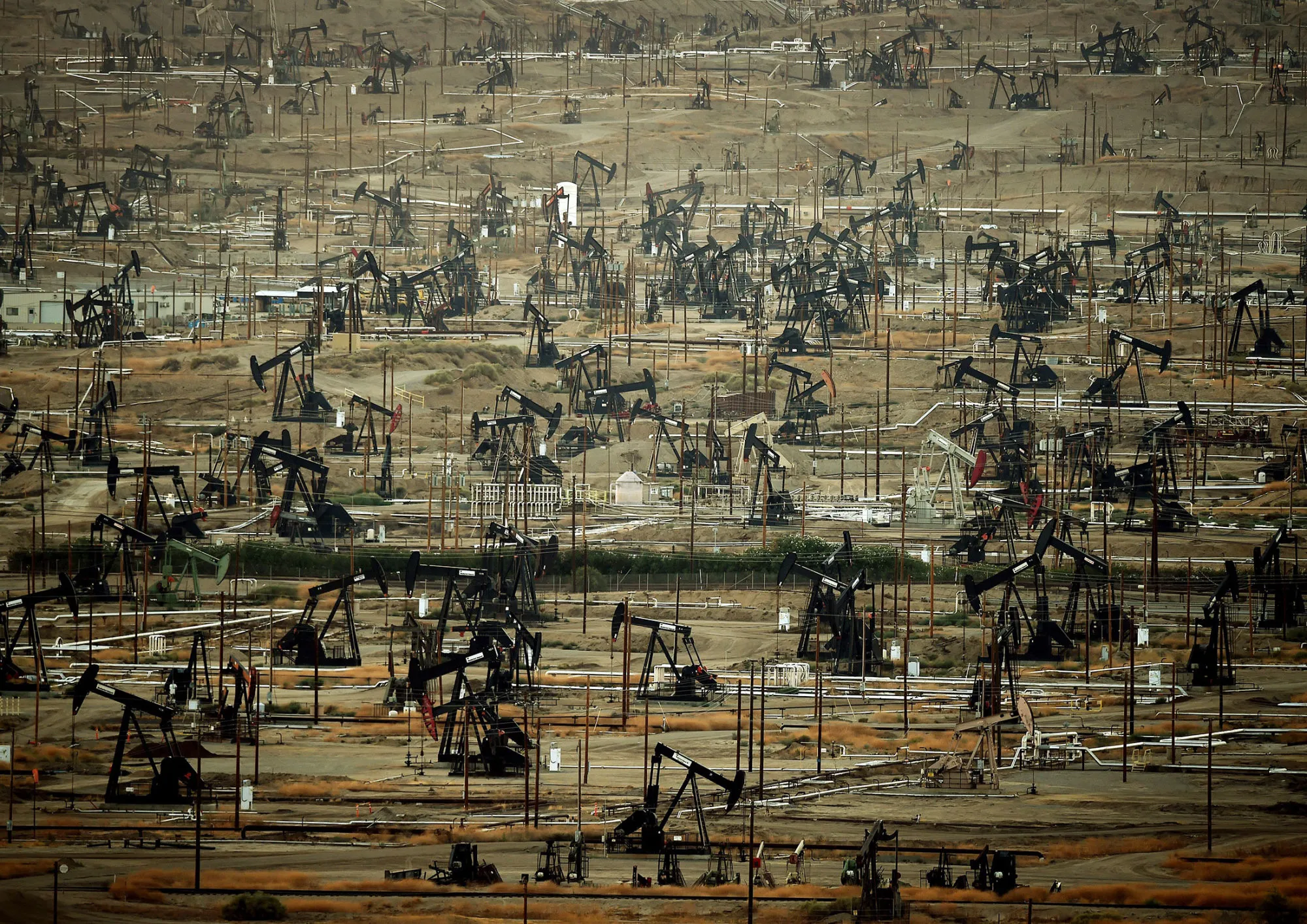 Oil-Producing States Battered as Tax-Gushing Wells Are Shut Down 