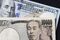 Japanese Yen and U.S. Dollar Banknotes Ahead of US-Japan Trade Talks