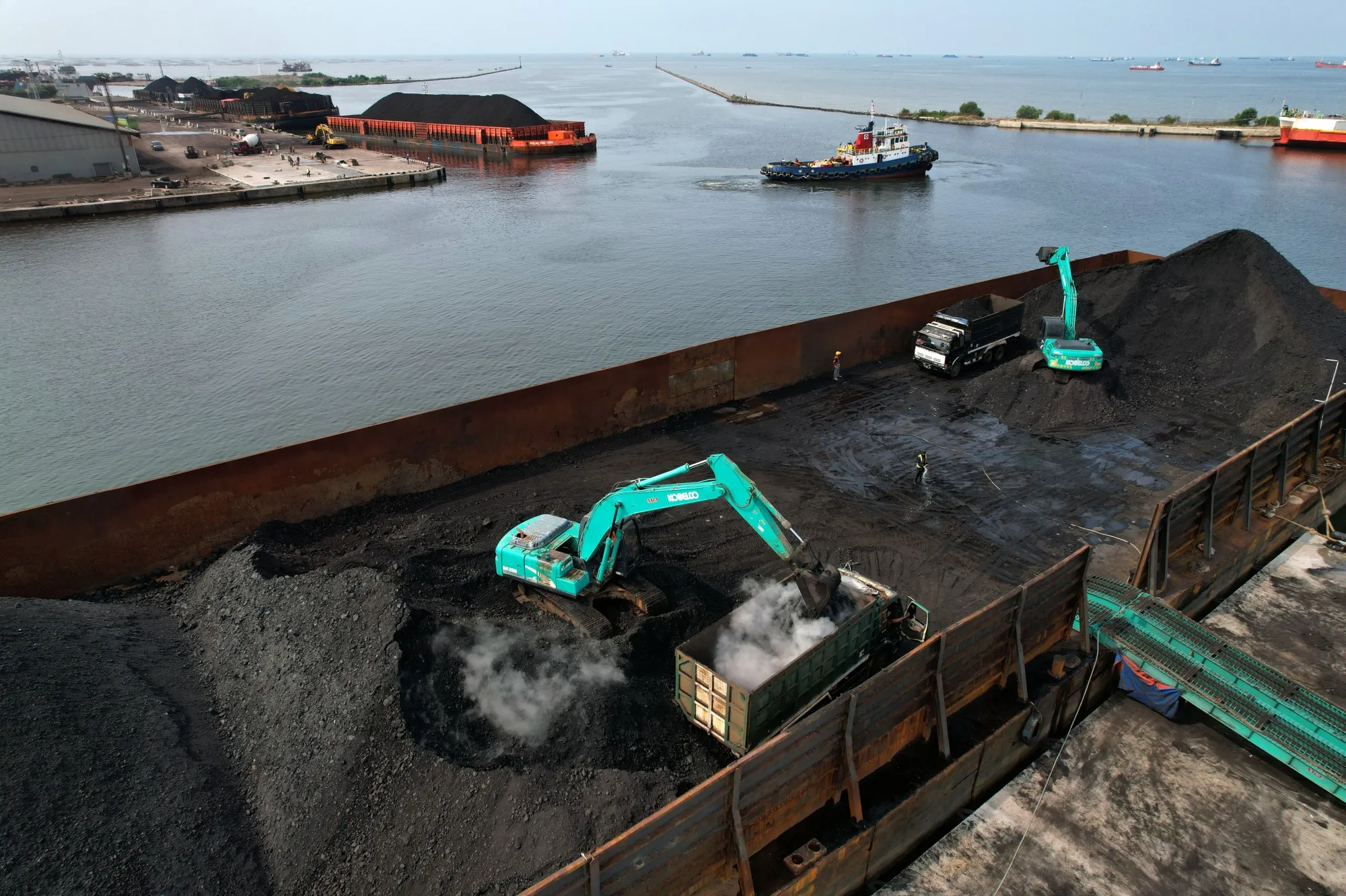 Coal loaded onto trucks at Cirebon Port in West Java, Indonesia.