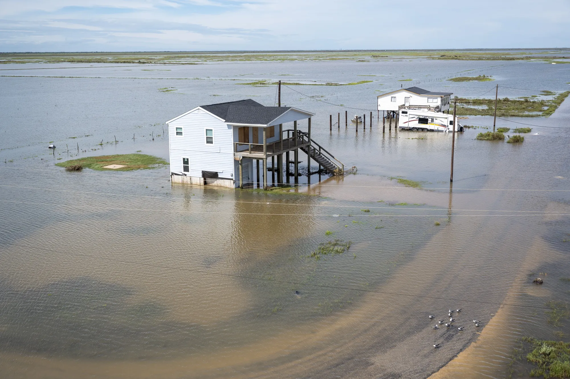 Homes surrounded by flood waters after Hurricane Beryl made landfall in Sargent, Texas, on July 8.