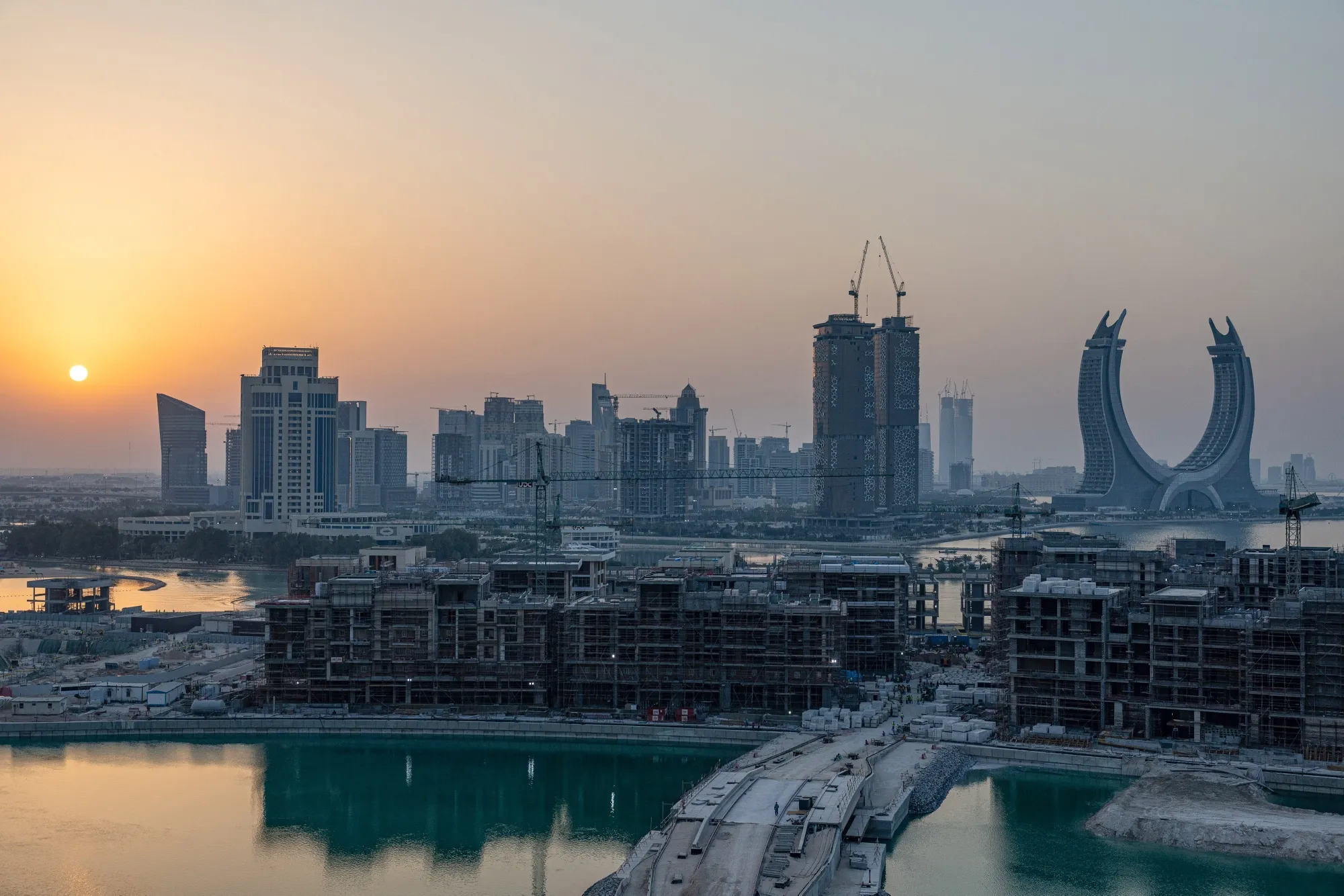 The Katara Towers&nbsp;behind construction work in Doha in 2022.
