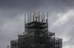 Workers remove scaffolding surrounding the Elizabeth Tower, also known as 'Big Ben', of the Houses of Parliament on Oct. 15.