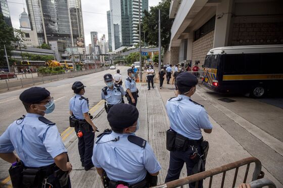 Hong Kong Police Arrest Apple Daily Writer in Ongoing Operation