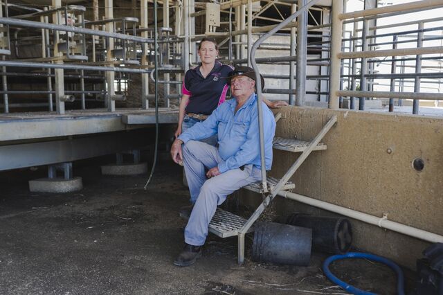 Meghan Campbell and her father Neil Campbell inside their former dairy milking shed in Blighty, NSW, Australia, on Dec. 20.
