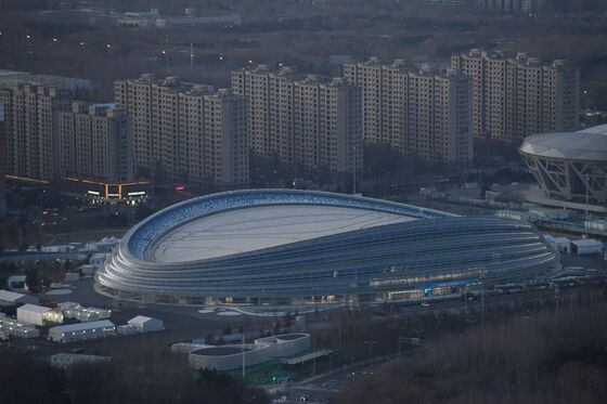 China’s Xi Visits Winter Olympics Venues as Challenges Mount