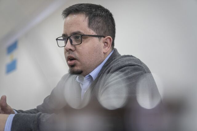 Santiago Pauli speaking during an interview inside his office. 