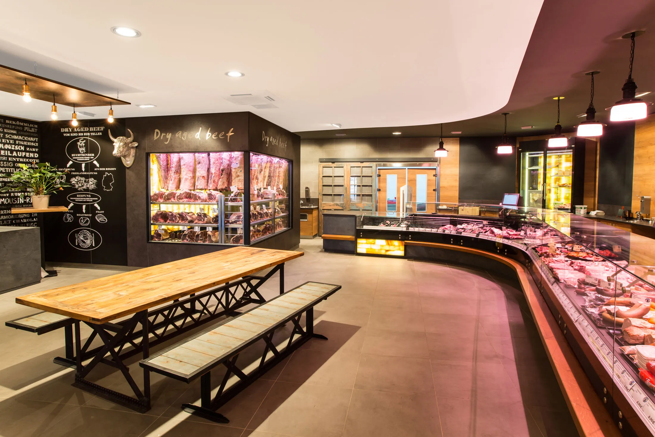 A Schrutka-Peukert deli counter and dry-age beef room.