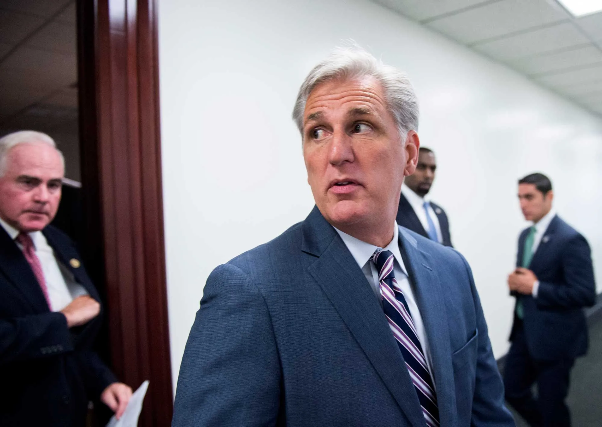 House Majority Leader Kevin McCarthy leaves the House Republican Conference meeting in the basement of the U.S. Capitol on Sept. 29.
