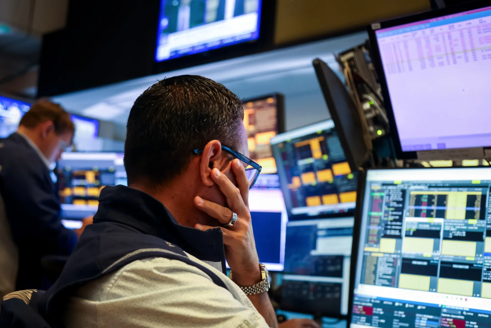 Traders work on the floor of the New York Stock Exchange (NYSE) on Aug. 1.&nbsp;