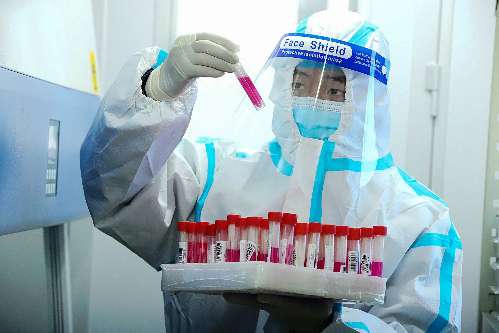 A laboratory technician at a temporary Covid-19 testing facility in Zhangye in China's northwestern Gansu province.