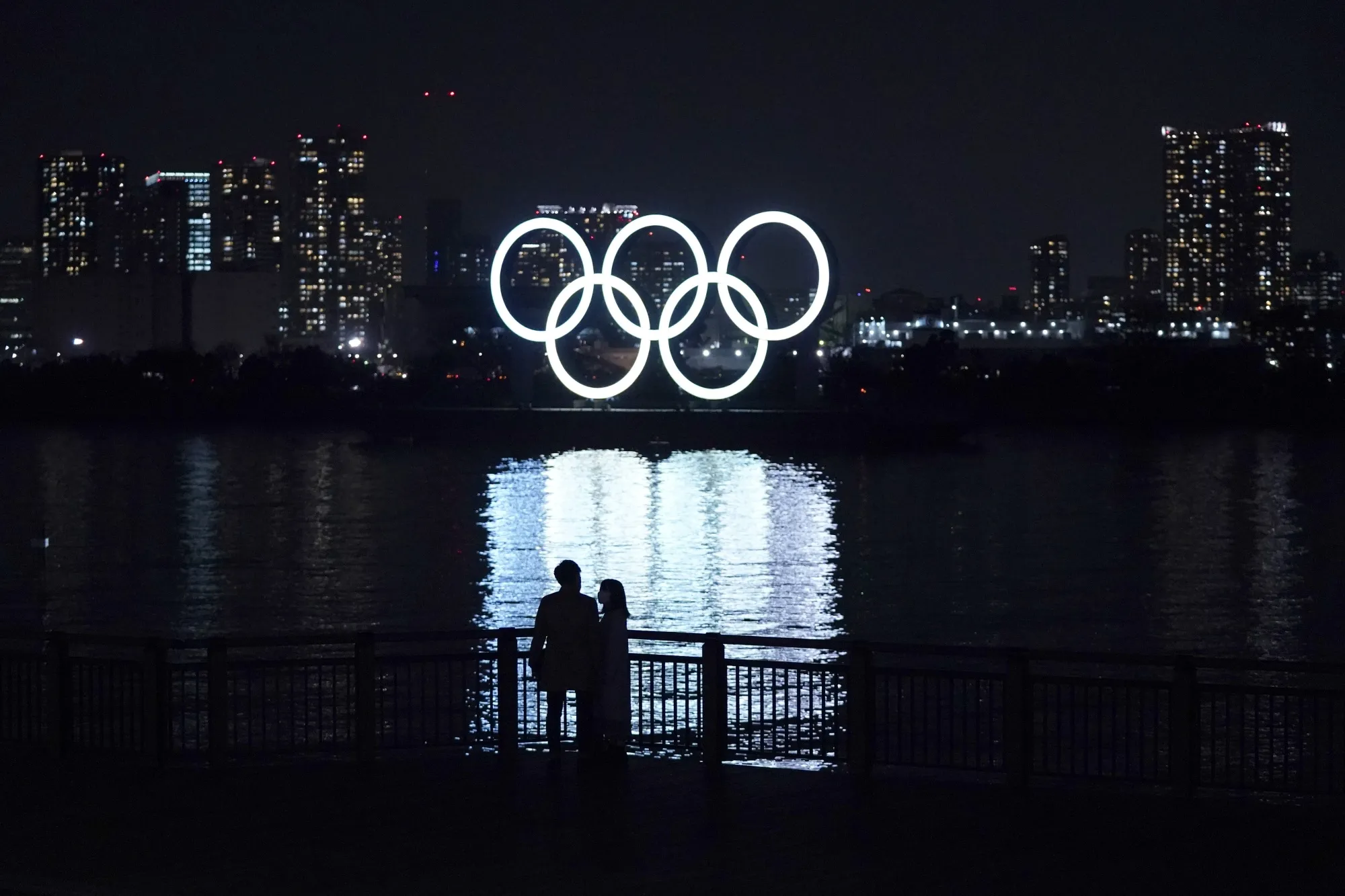 Illuminated Olympic rings floating in the waters off Odaiba island on Jan. 14.