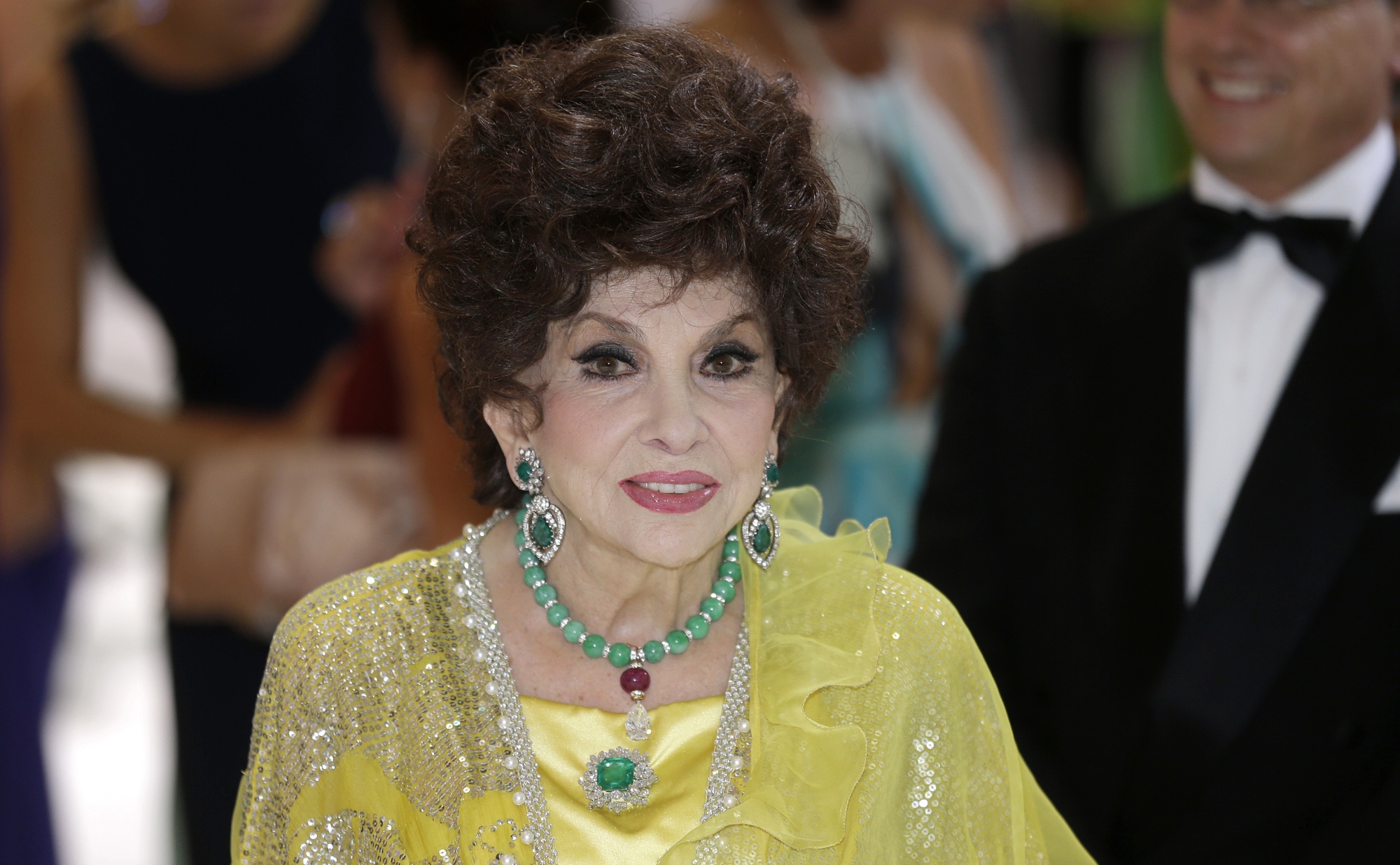 Italian actress Gina Lollobrigida arrives at the &quot;Monaco Red Cross Ball&quot;, Friday, Aug. 1, 2014, in Monaco. Italian film star Gina Lollobrigida has died in Rome at age 95. Italian news agency Lapresse reported Lollobrigida’s death on Monday, Jan. 16, 2023 quoting Tuscany Gov. Eugenio Giani. (AP Photo/Lionel Cironneau, File)