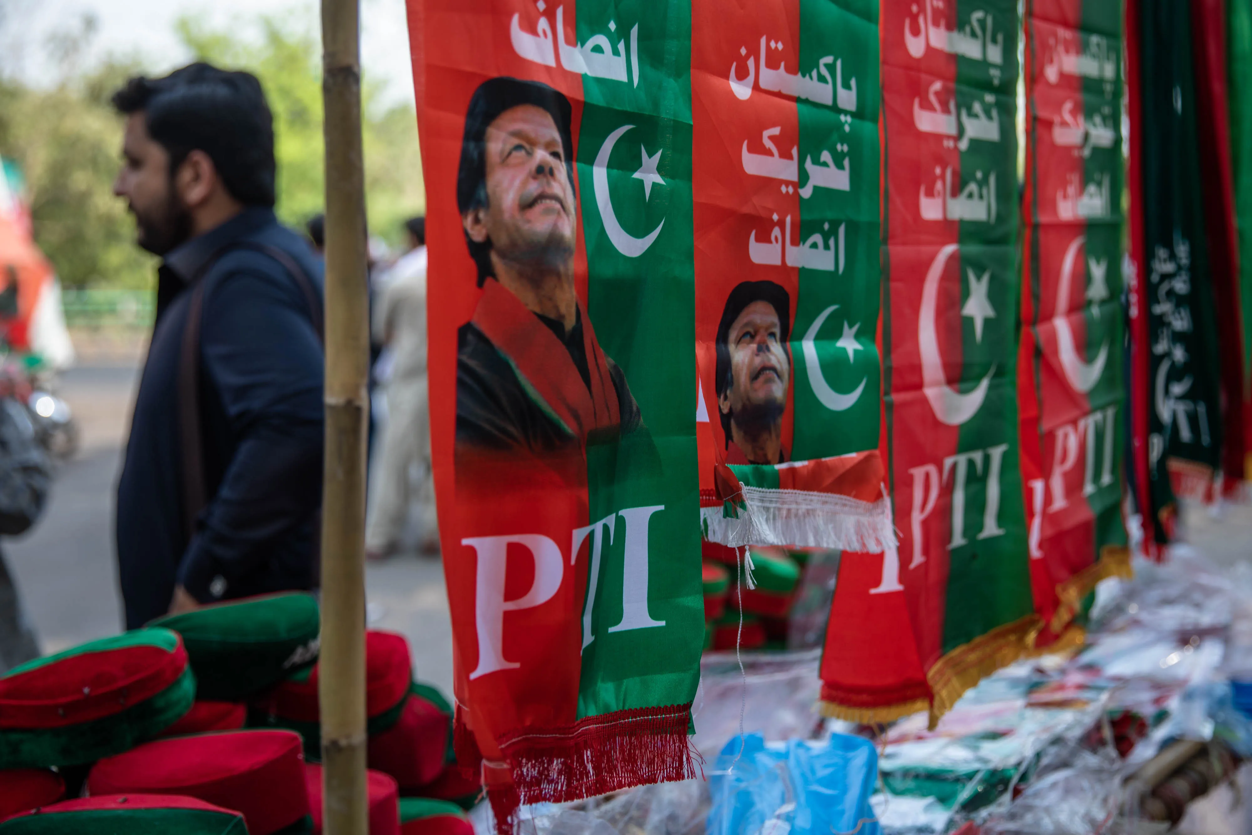 Merchandise for the Pakistan Tehreek-e-Insaf (PTI) party near the residence of Imran Khan.&nbsp;