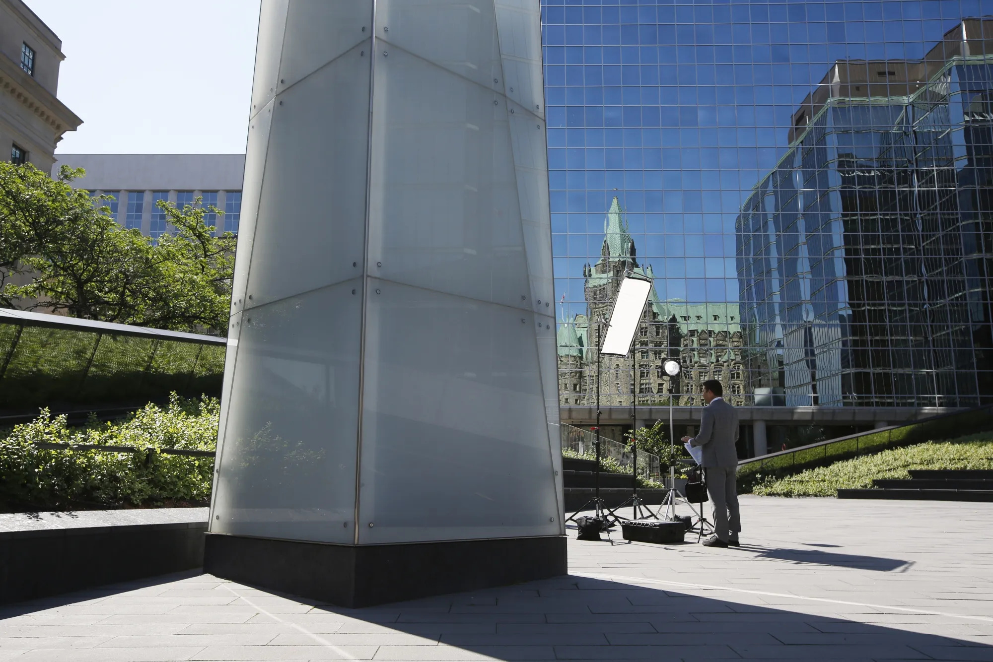 A member of the media outside the Bank of Canada in Ottawa, Ontario, on&nbsp;July 13.&nbsp;