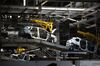 Painted Renault Captur crossover sport utility vehicle (SUV) body shells travel along a conveyor on the production line inside the Renault SA automobile plant in Moscow, Russia, on Tuesday, May 28, 2019. A prospective deal proposed by Fiat Chrysler Automobiles NV to merge with Renault could create the world's third-biggest carmaker.