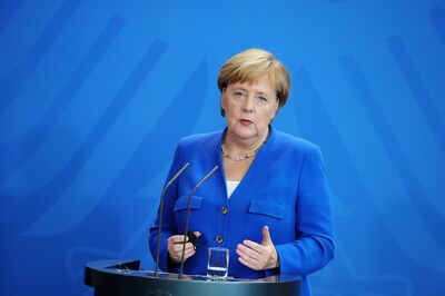 Germany's Chancellor Merkel Reopens To President Erdogan As Trump Squeezes Turkey's Economy
