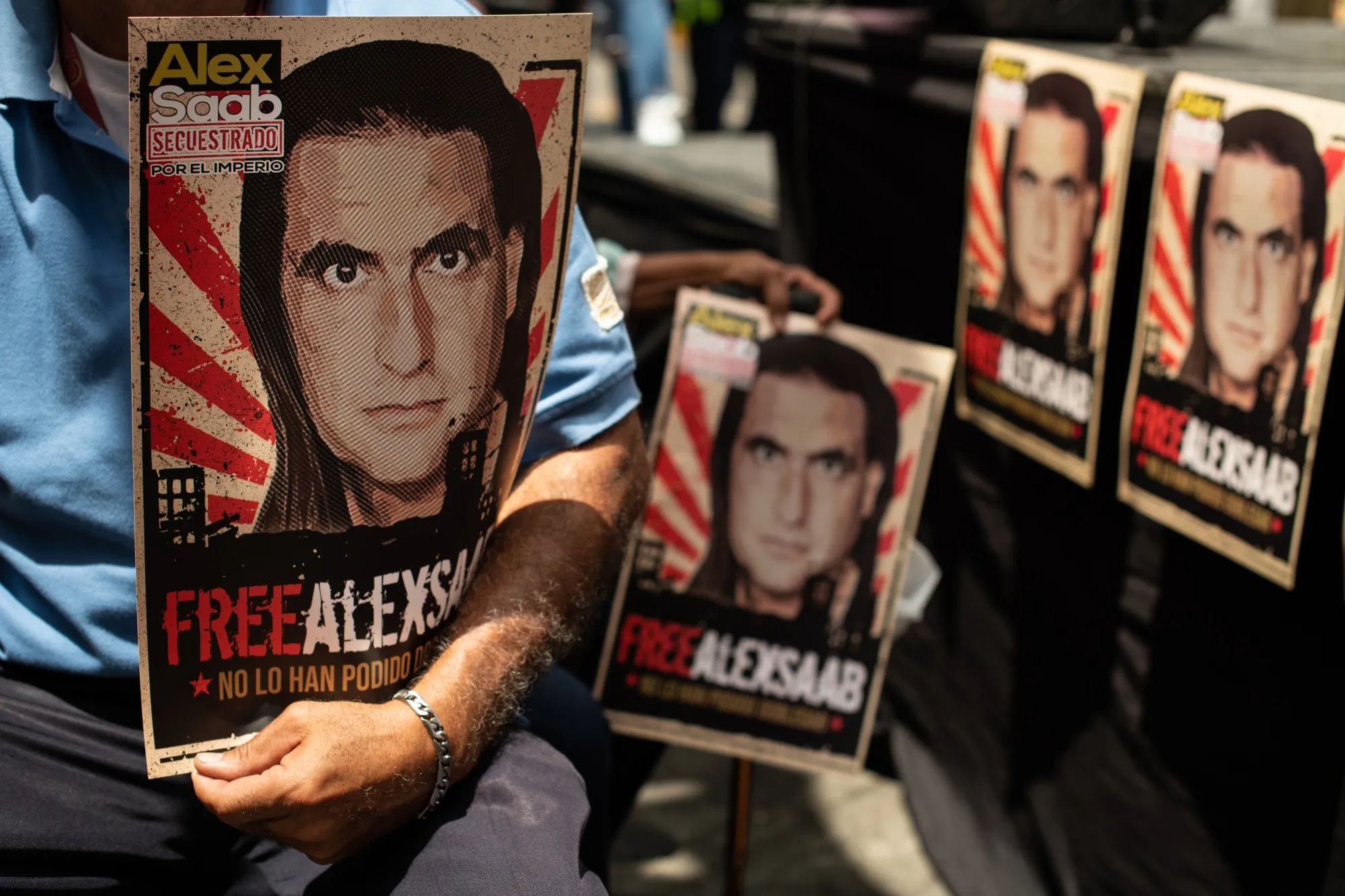 Posters during a rally in support of Alex Saab in Caracas, Venezuela in April 2022.&nbsp;