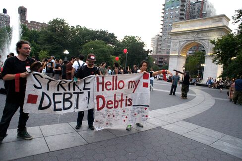 People protest against student debt at Washington Square Park in New York’s Greenwich Village