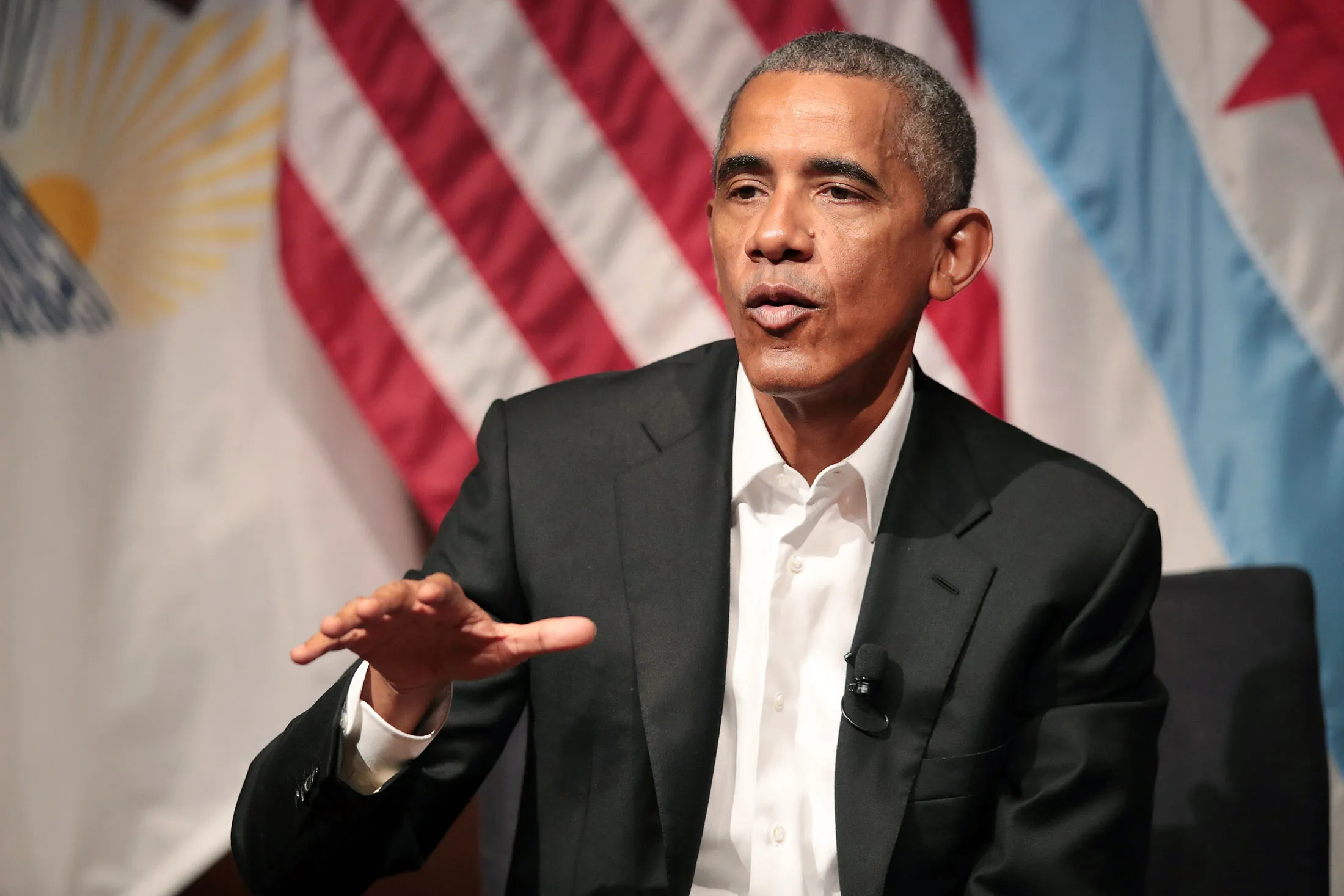 Former U.S. President Barack Obama visits with youth leaders at the University of Chicago to help promote community organizing on April 24, in Chicago.
