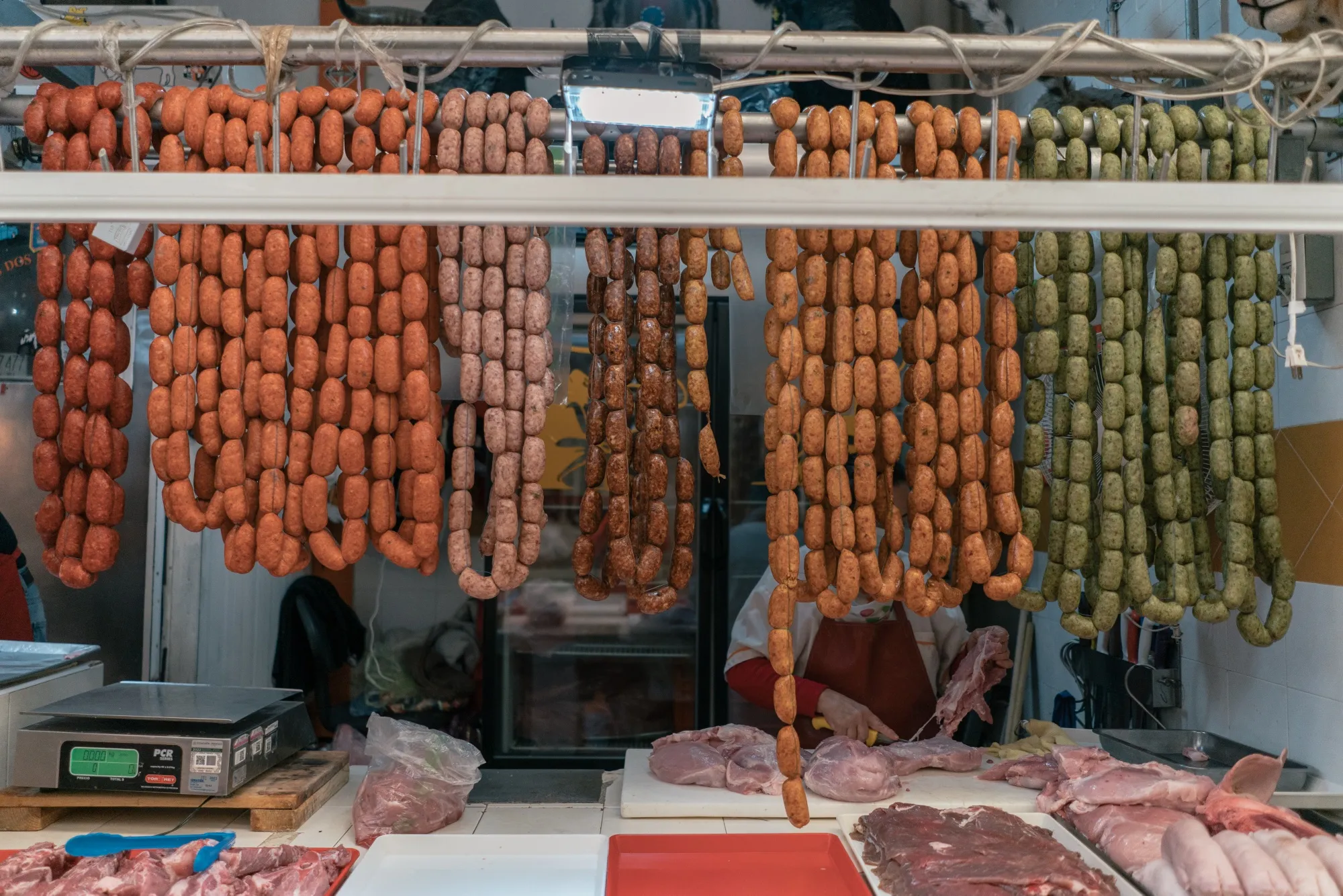 A butcher slices pork at a market in Toluca, Mexico.
