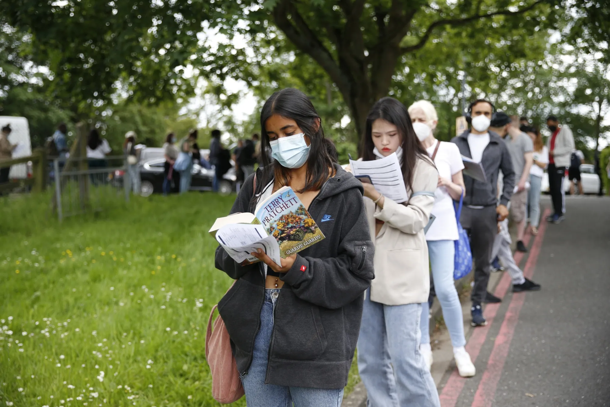 People line up for their jabs.