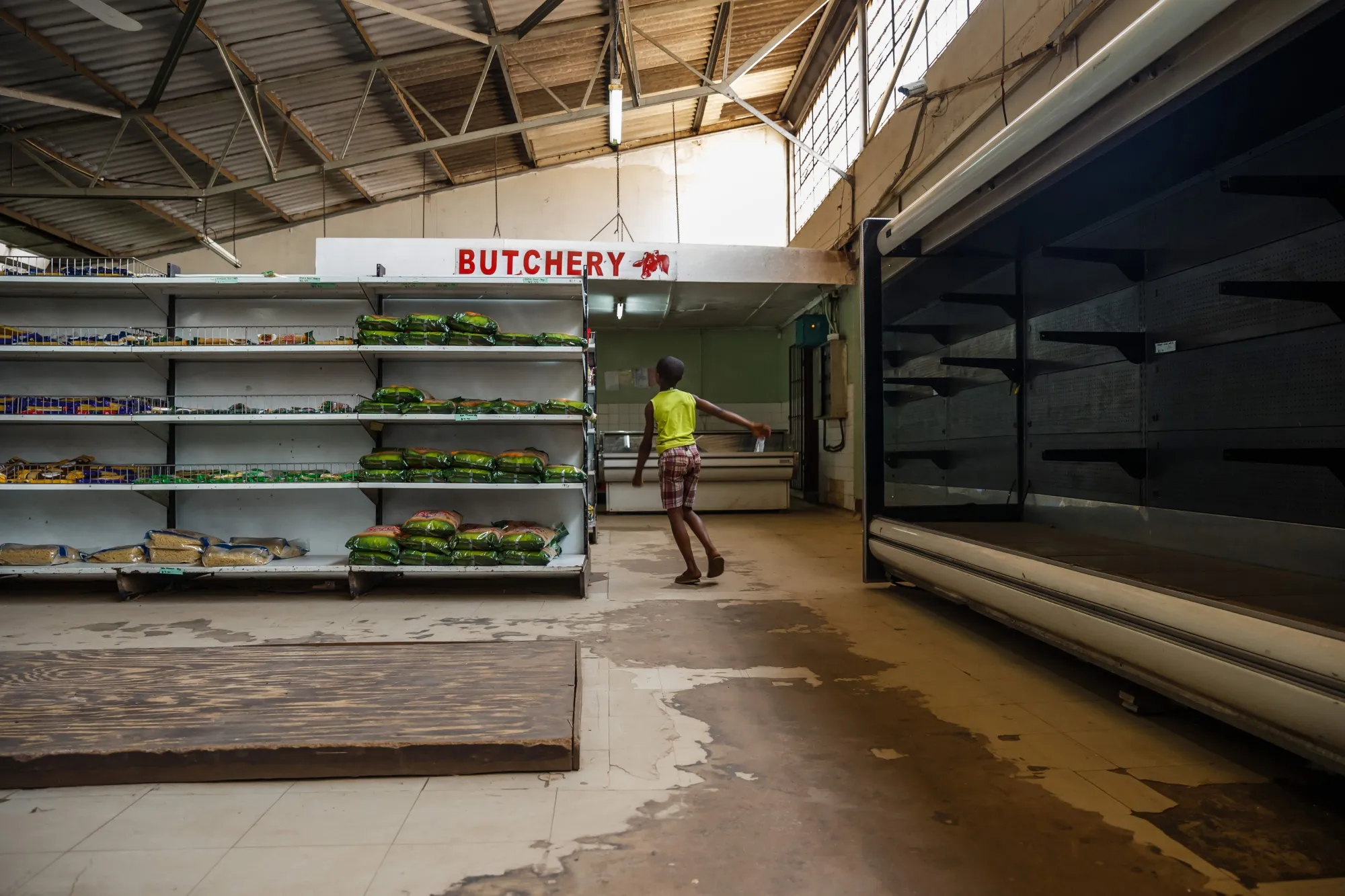 Empty shelves in a grocery store in Harare.