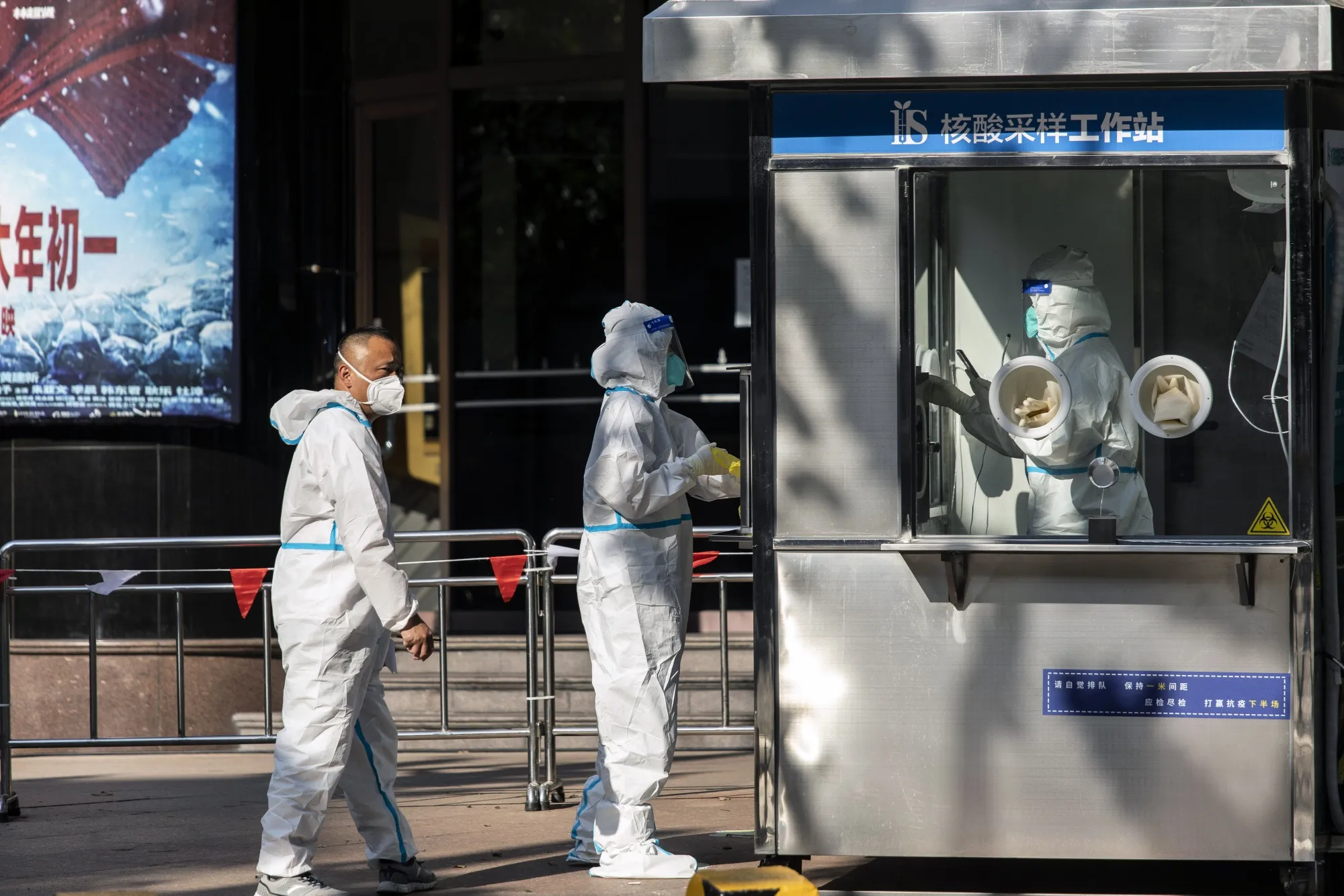 Healthcare workers at a Covid-19 testing facility&nbsp;in Shanghai, on May 5.
