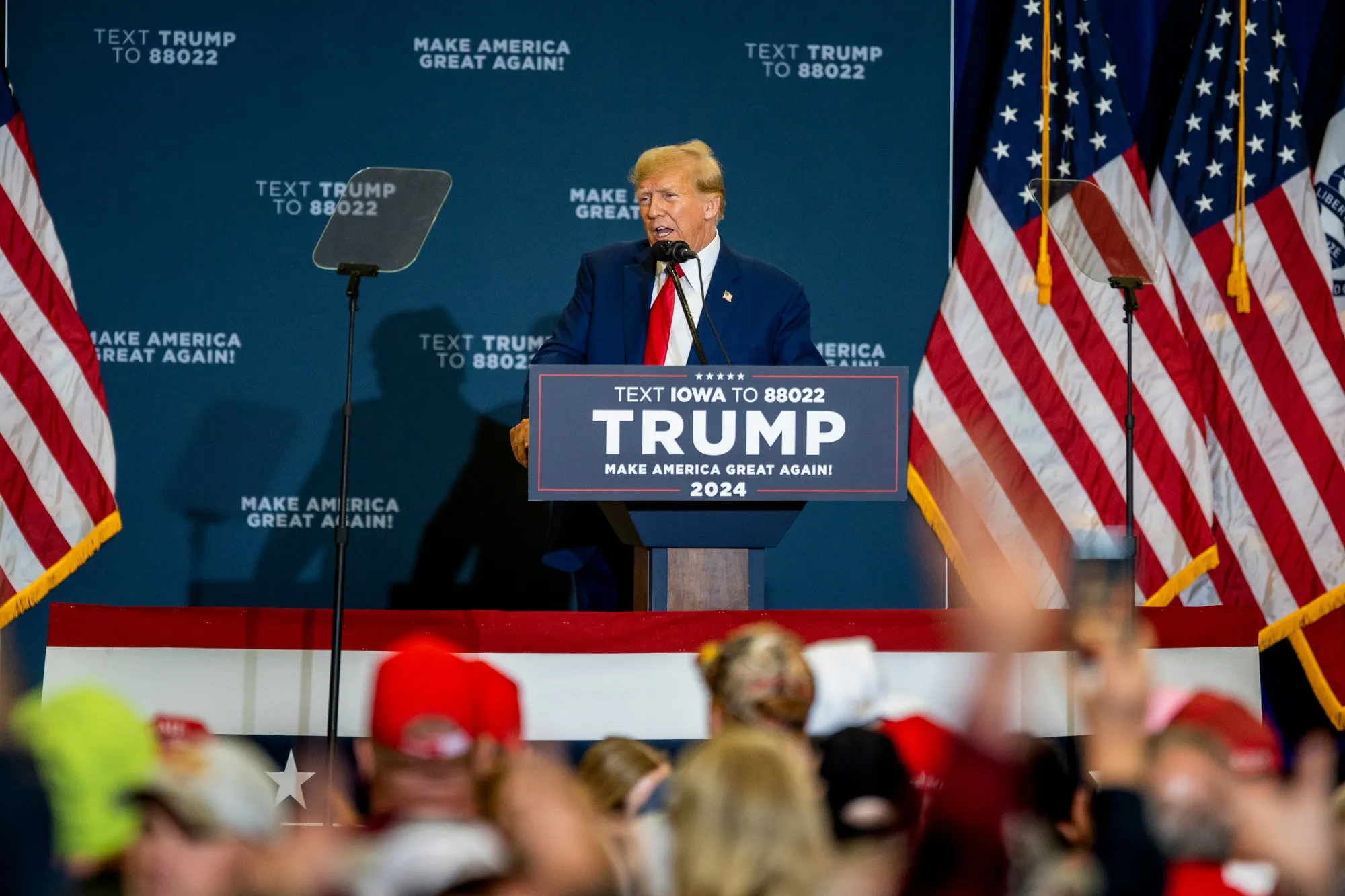 Former President Donald Trump speaks during a campaign rally in Mason City, Iowa, on Friday.