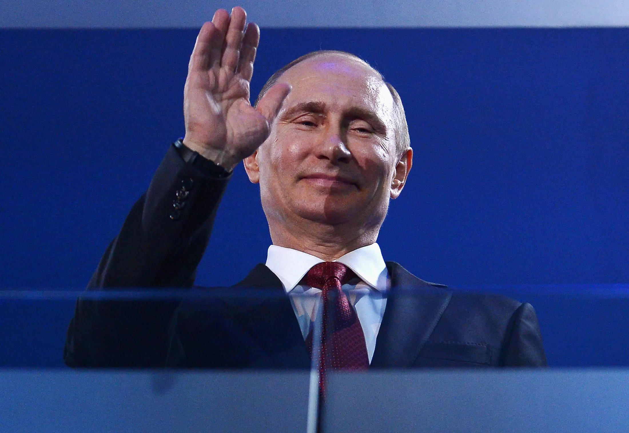 SOCHI, RUSSIA - MARCH 16: Russia President Vladimir Putin waves during the Sochi 2014 Paralympic Winter Games Closing Ceremony at Fisht Olympic Stadium on March 16, 2014 in Sochi, Russia.
