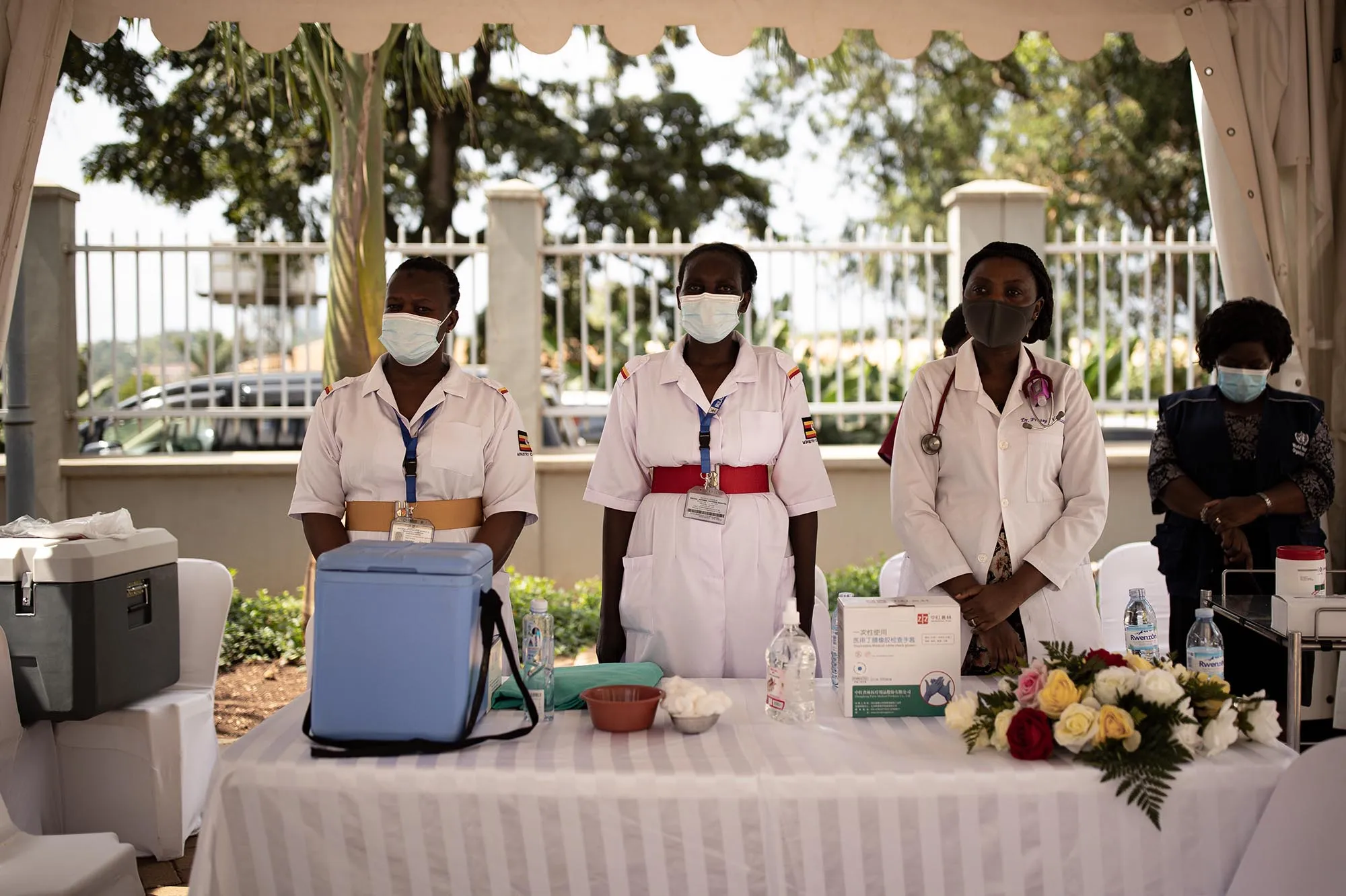 Healthcare workers take a brief moment of silence to remember colleagues who have succumbed to coronavirus&nbsp;in Kampala, Uganda.