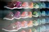 Nike Inc. 'Free' model sneakers sit on display in the window of the Nike Store inside the Westfield London shopping mall, operated by Westfield Corp. in London, U.K., on Tuesday, Feb. 23, 2016. The U.K.'s potential exit from Europe may damage trade and encourage other members to renegotiate their relationship with the EU, signalling scope for further losses in the euro in the run-up to Britain's June 23 referendum.
