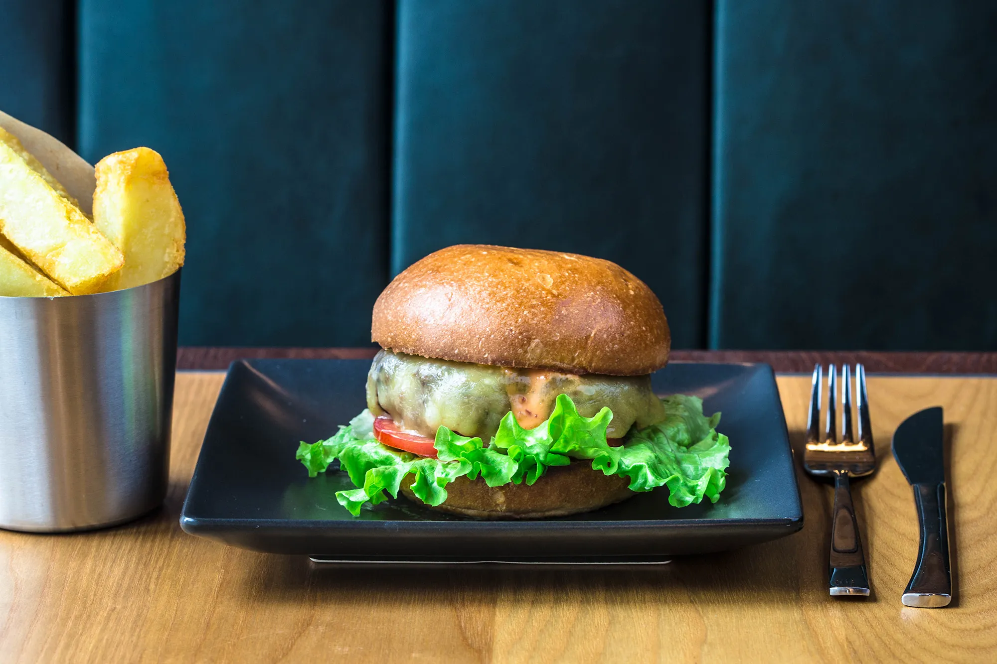 The short-rib beef burger comes with hickory-smoked bacon ketchup and Monterey Jack cheese. The chips are chunky to the max. Source: Heddon Street Kitchen