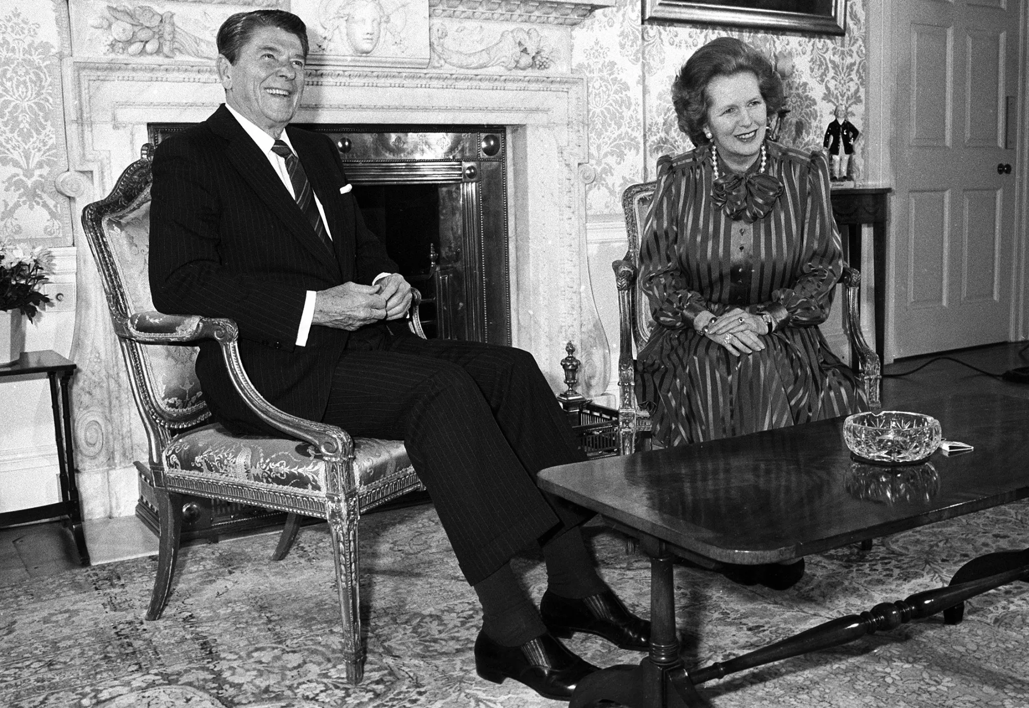 Ronald Reagan sits with Margaret Thatcher at 10 Downing Street, in London, on June 5, 1984.
