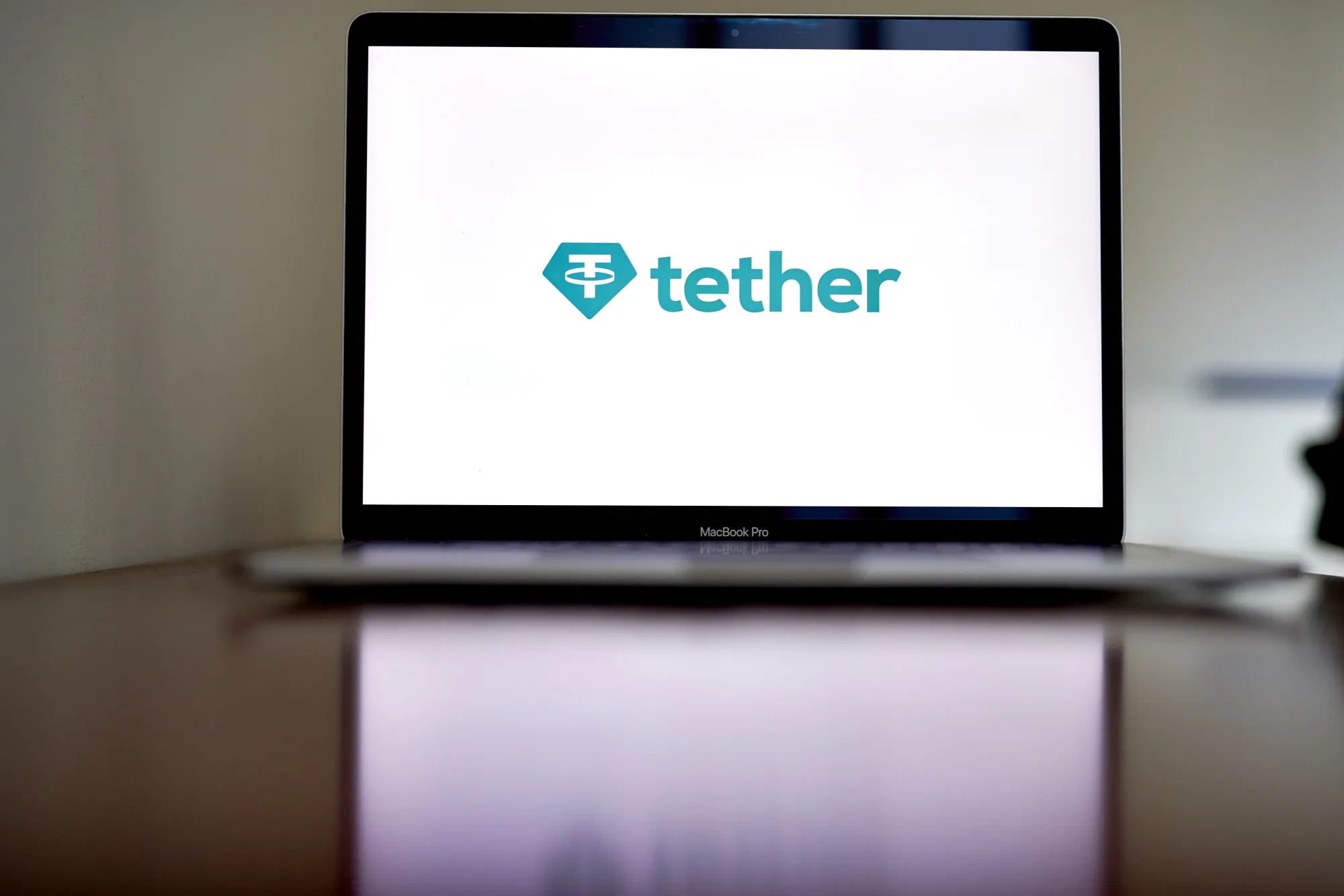 The Tether logo on a laptop computer.&nbsp;