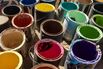 High Angle View Of Multi Colored Paint Cans