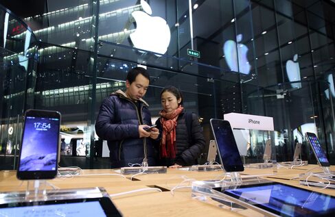 Shoppers Inside An Apple Inc. Store in Beijing