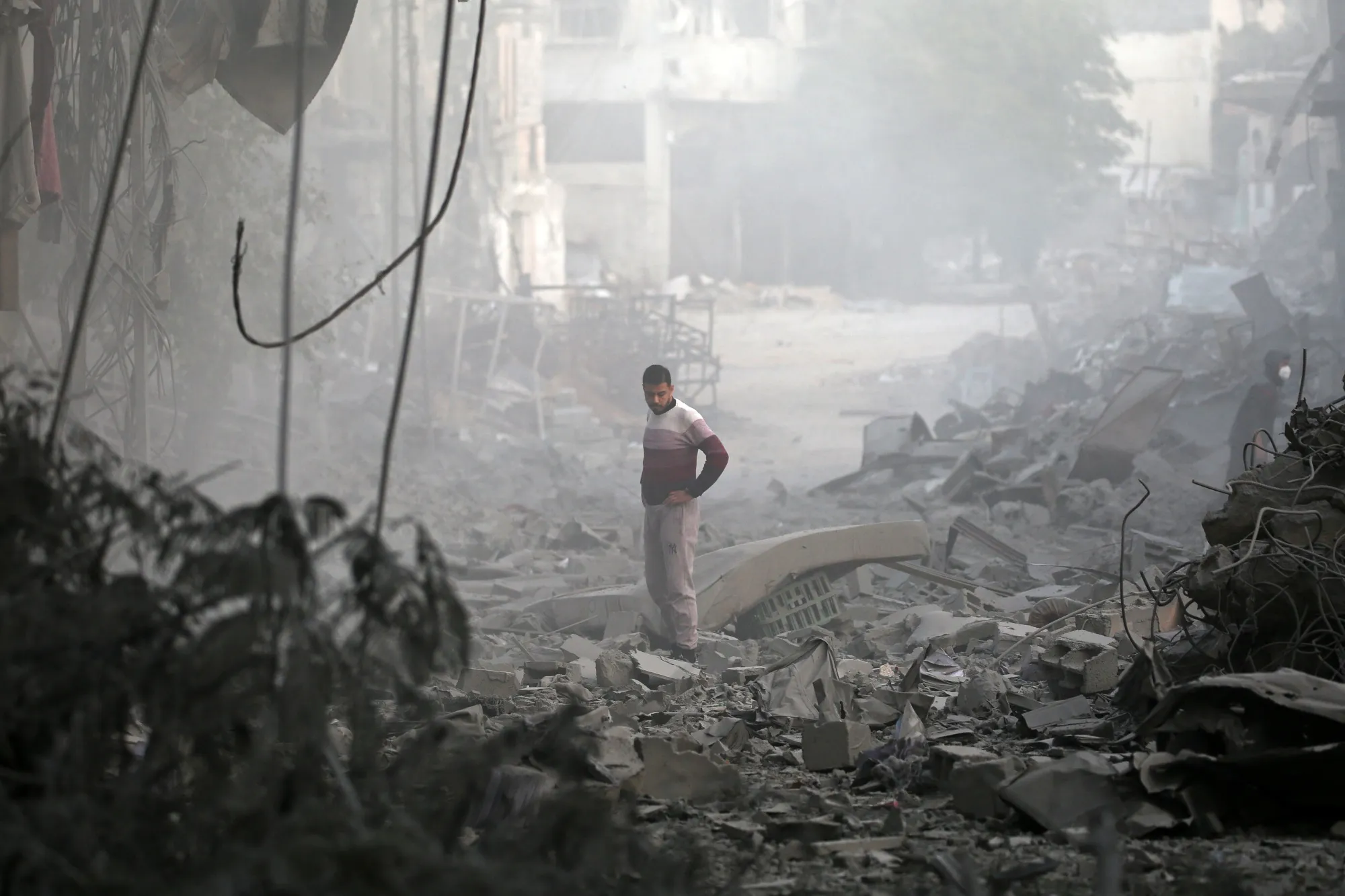 The rubble of buildings destroyed in Israeli airstrikes at the Bureij camp for Palestinian refugees in the central Gaza Strip on Jan. 12.