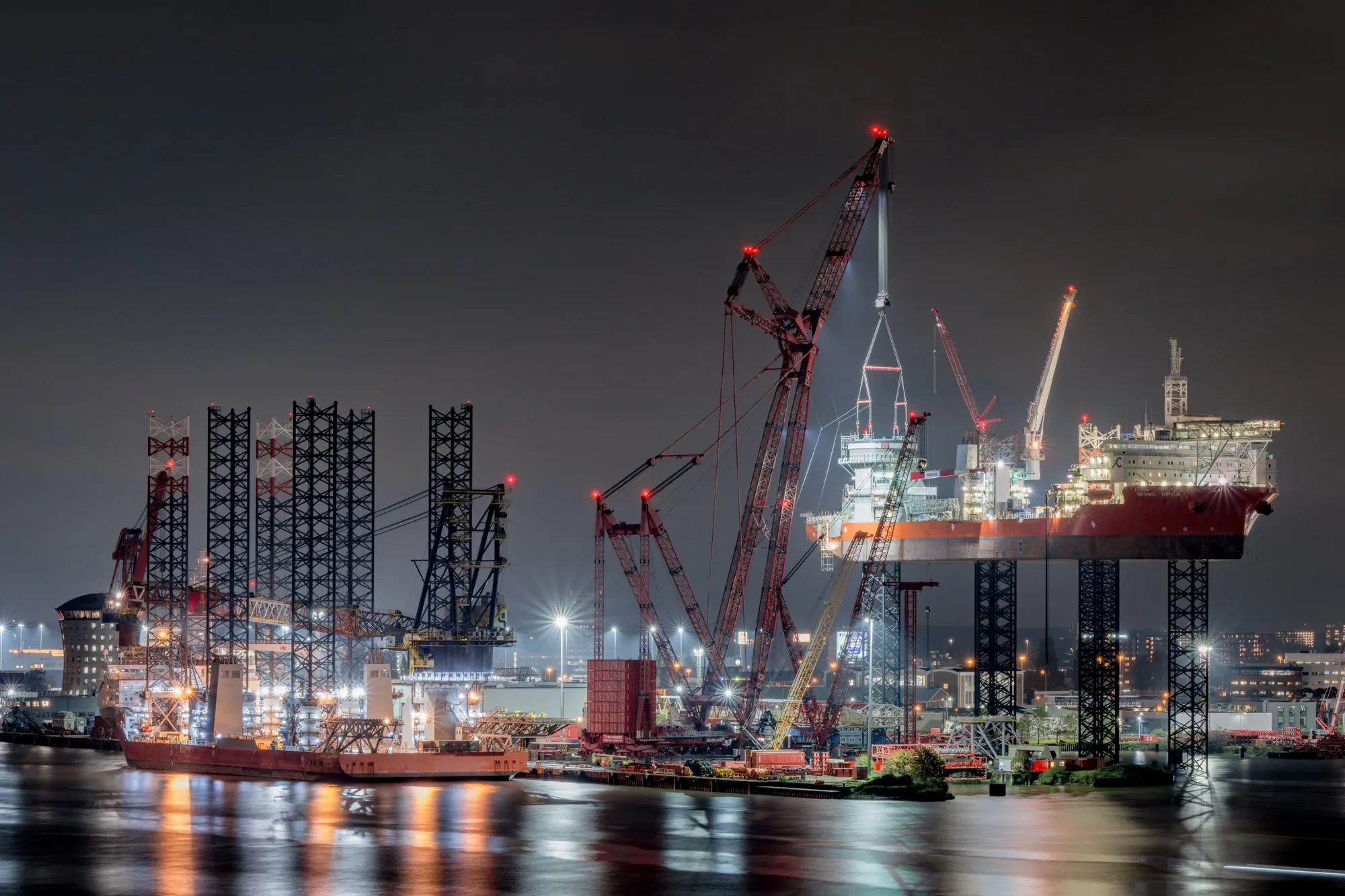Cadeler A/S wind turbine vessels Wind Osprey, left, and Wind Orca during the installation of new cranes in Rotterdam, Netherlands, in October.