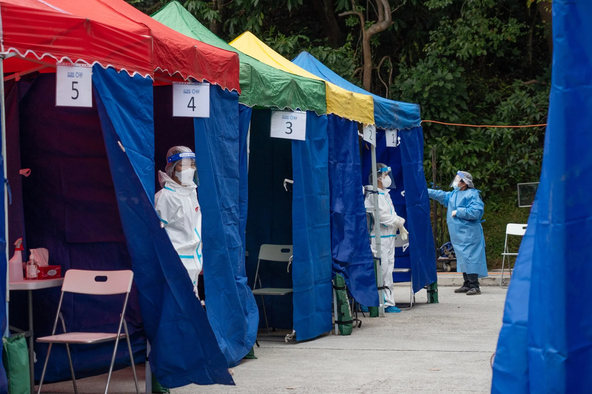 Health workers at a Covid-19 testing facility in Discovery Bay on Lantau Island in Hong Kong on Feb. 9.