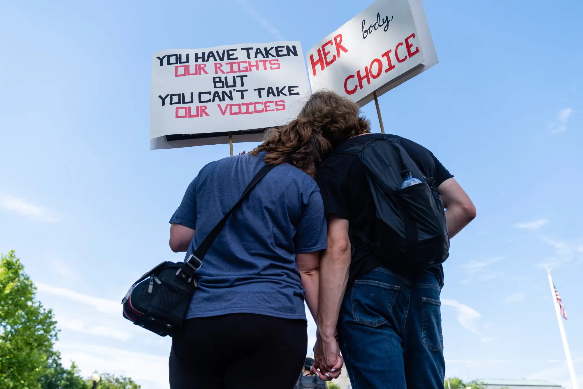 A couple supporting abortion rights outside the Supreme Court in Washington, D.C., on June 27.