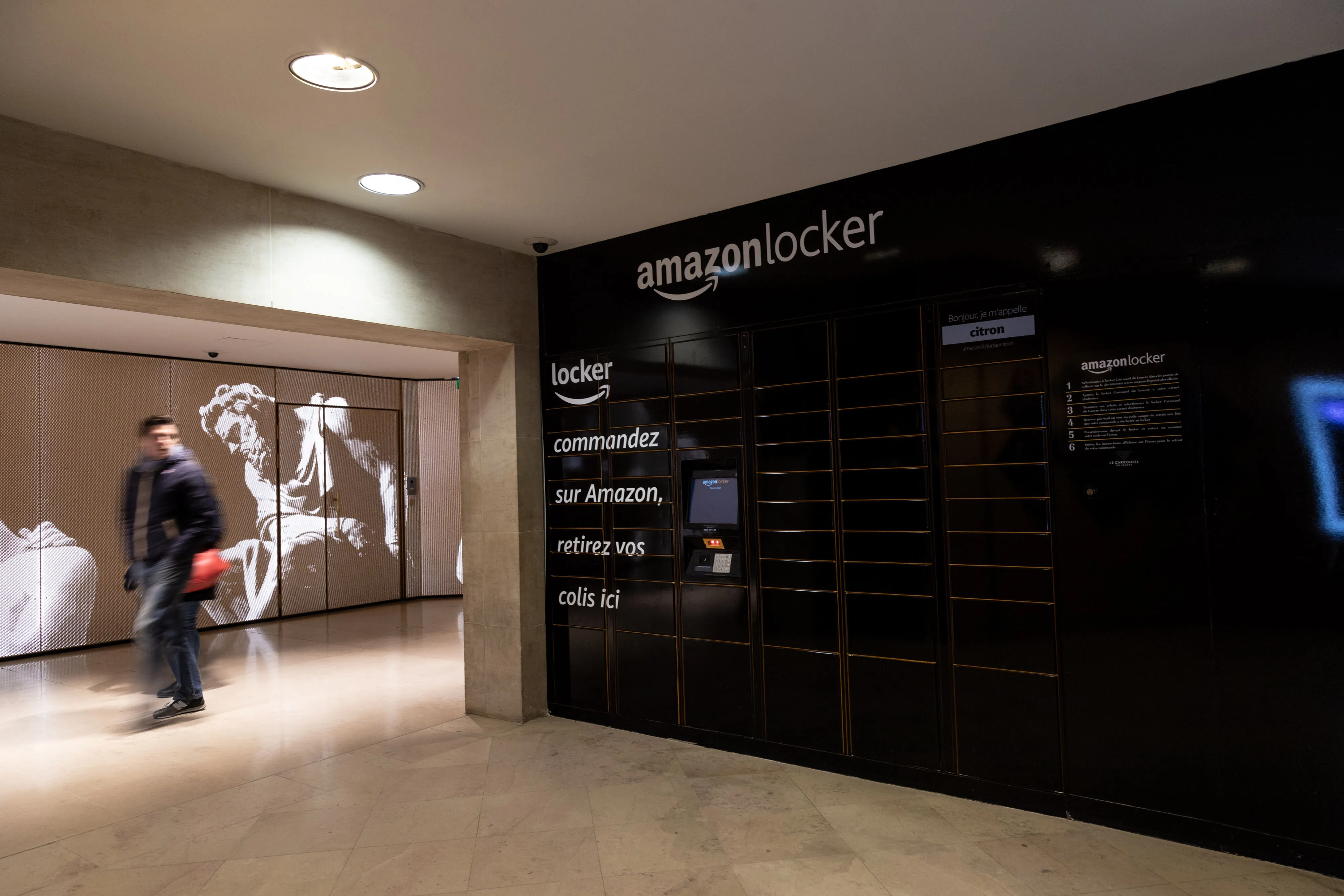 Amazon.com lockers at the Louvre metro railway station in Paris.