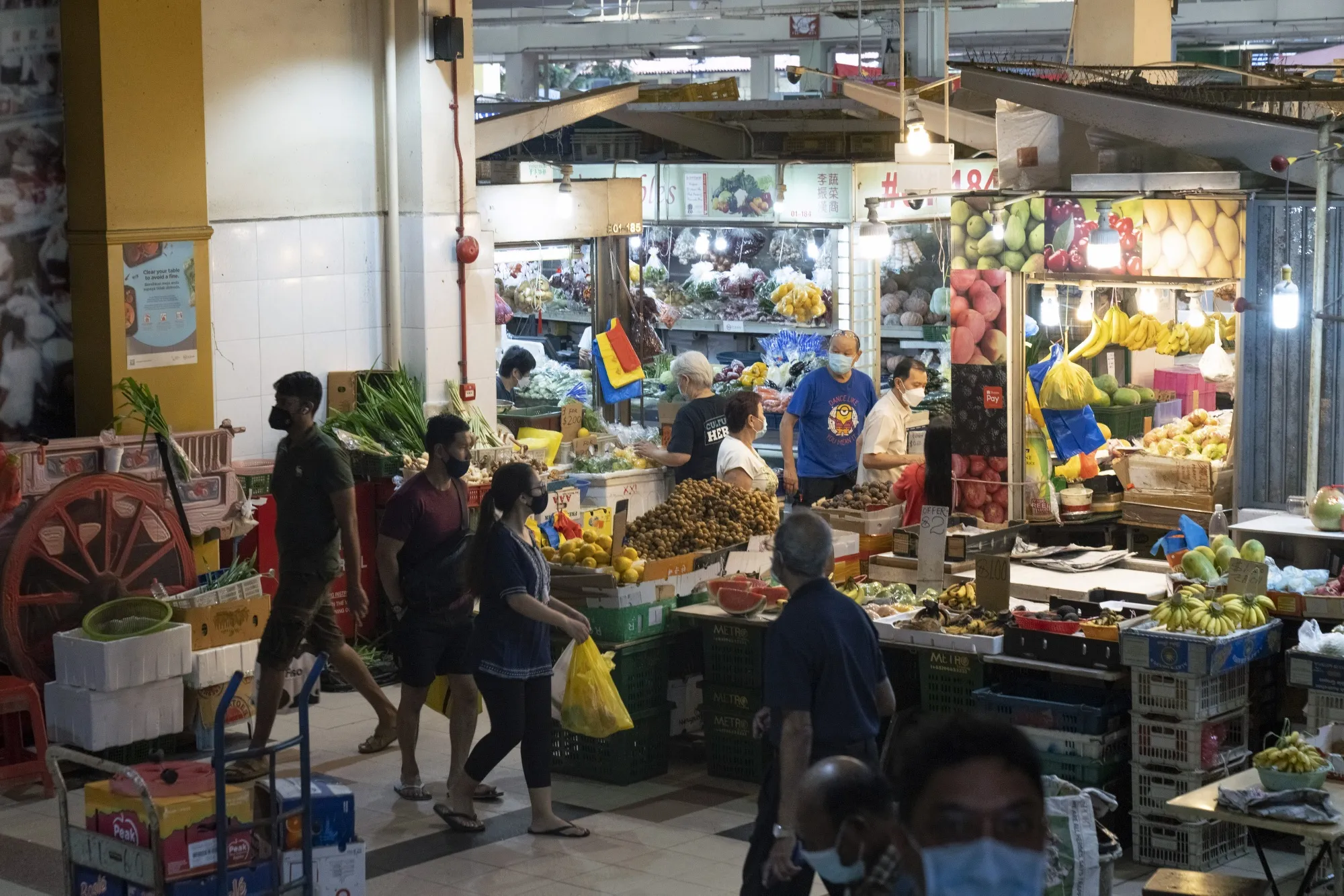 Shoppers at a market in Singapore.