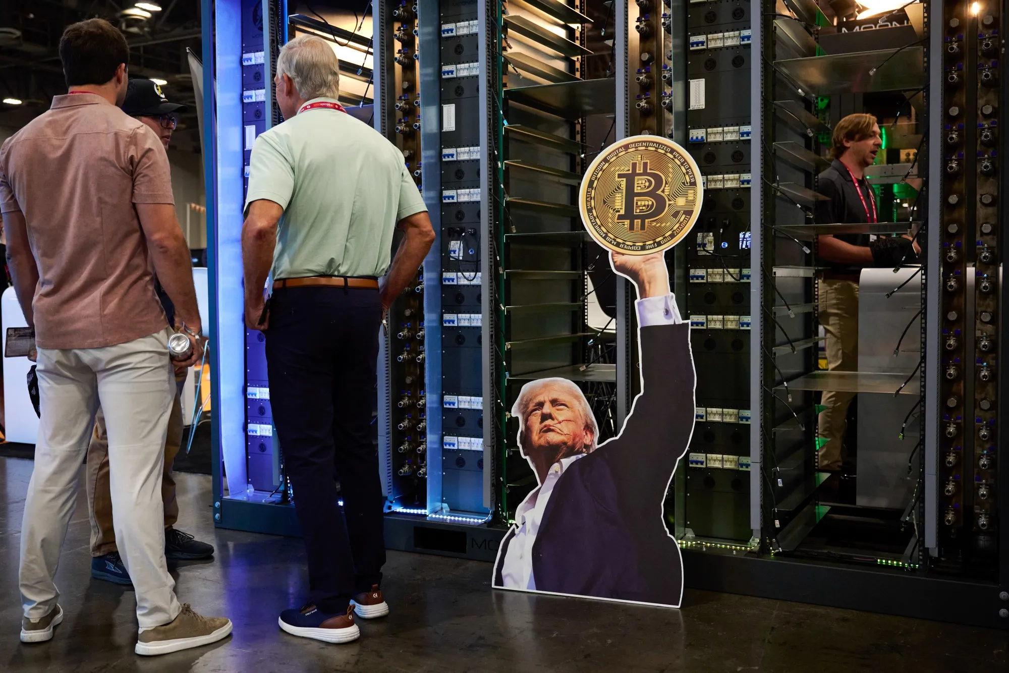 A cutout of US President Donald Trump holding a Bitcoin token during the Bitcoin 2025 conference in Las Vegas.