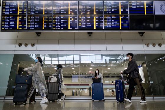 Asia Tries to Fight a Second Wave of Virus Cases Sparked by Travelers